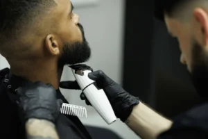 barber-cutting-beard-african-american-600nw-2665860835